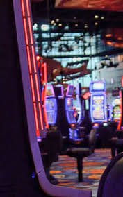 Filipino player browsing okey play platform information on mobile phone